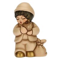 Presepe Classico child with beige apple