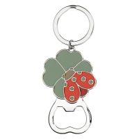 Metal bottle opener with four-leaf clover and Ella ladybird