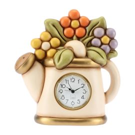 Table clock with watering can and flowers