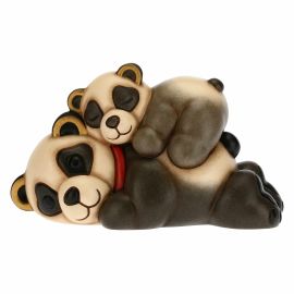 Mum Panda hugging playful cub