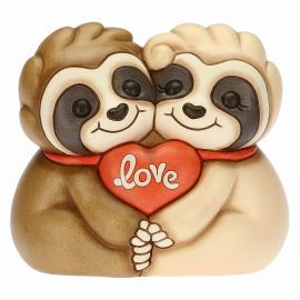 Male and female sloth couple with Love is the key