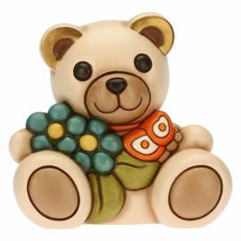 Teddy mit blauem Blumenstrauß