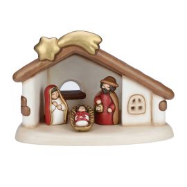 Stable set with shooting star and Holy Family with Jesus, Joseph and Mary