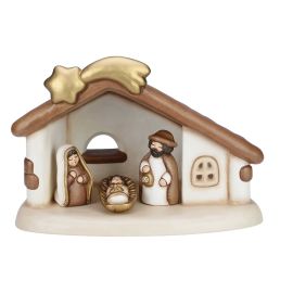 Stable set with shooting star and Holy Family with Jesus, Joseph and Mary